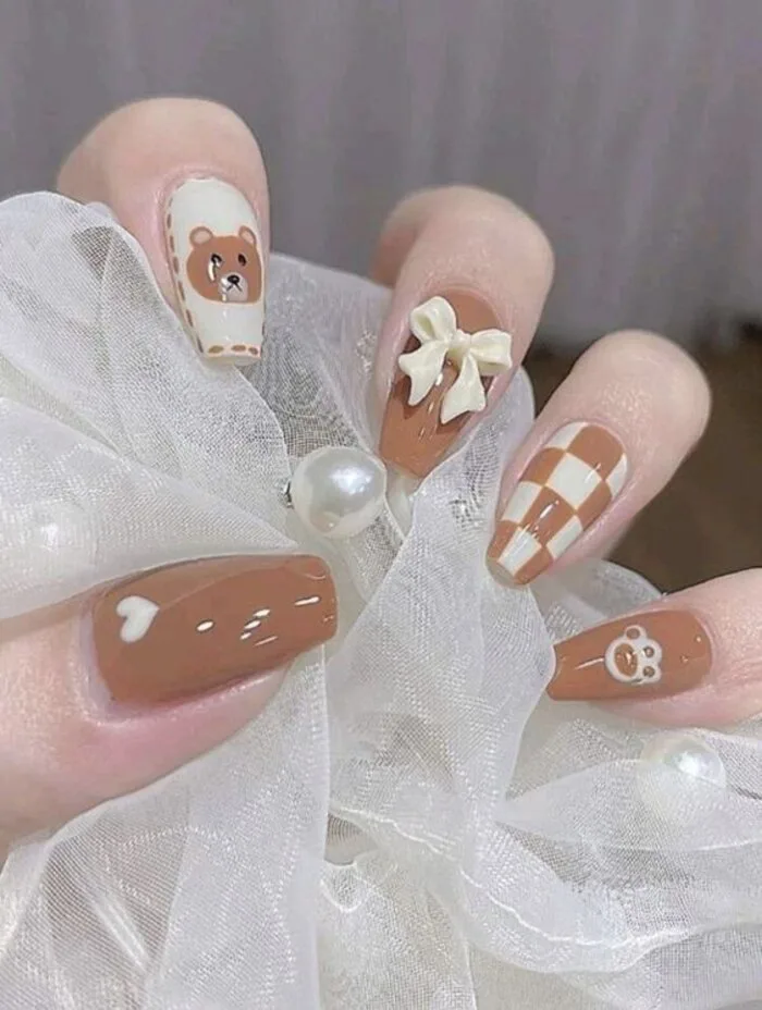 100+ mẫu nail đính nơ đẹp xinh khiến đối phương đổ gục