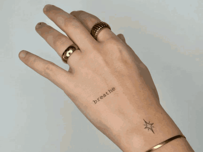 39 Small Wrist Tattoos That Speak Volumes
